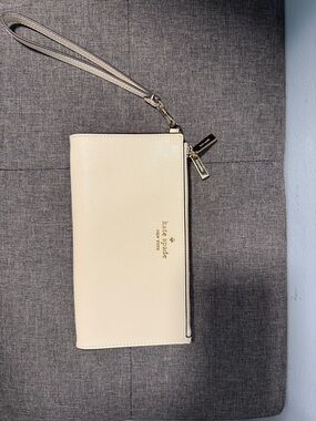 kate spade pale cream leather wristlet clutch with gold hardware